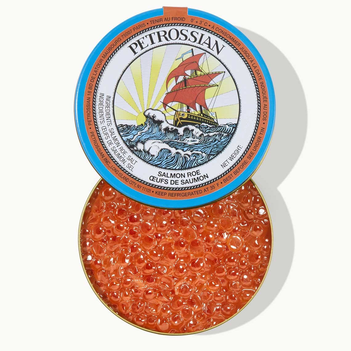 Petrossian salmon roe container with blue lid on a white background